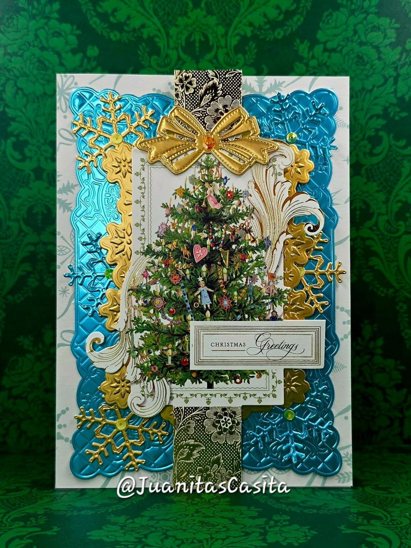 Card No.22 for week 22 of the Make One Christmas Card Every Week Challenge for 2026. The @uspostalservice does not make it's easy for us to mail super dimensional cards, let's be honest! It's become a lot pricier. And I always send my cards non machinable, or what us older folks call hand cancel. I've been trying to make cards that are a little bit flatter, but gosh darn it, I need some dimension I need some bling!!!! But this is definitely part of my "flatter" series!

@annagriffininc dies, cardstock, collage card topper 

#juanitascasita #feliznavidad #christmasCards #handmadecards #fyp